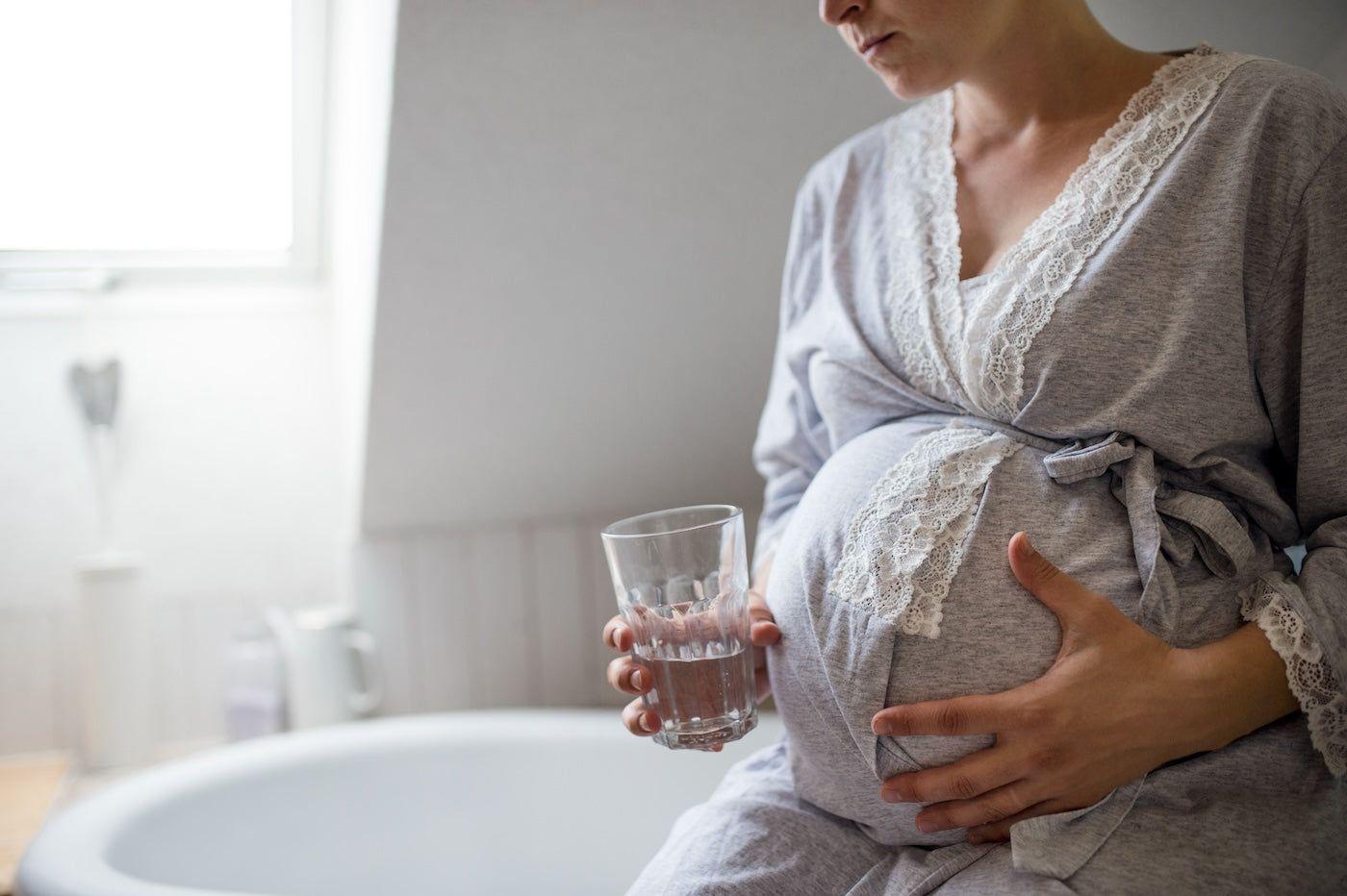 uncomfortable pregnant woman